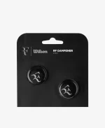 Black RF vibration dampeners (2-pack) featuring Roger Federer’s logo, designed to reduce racket shock and improve playing comfort.